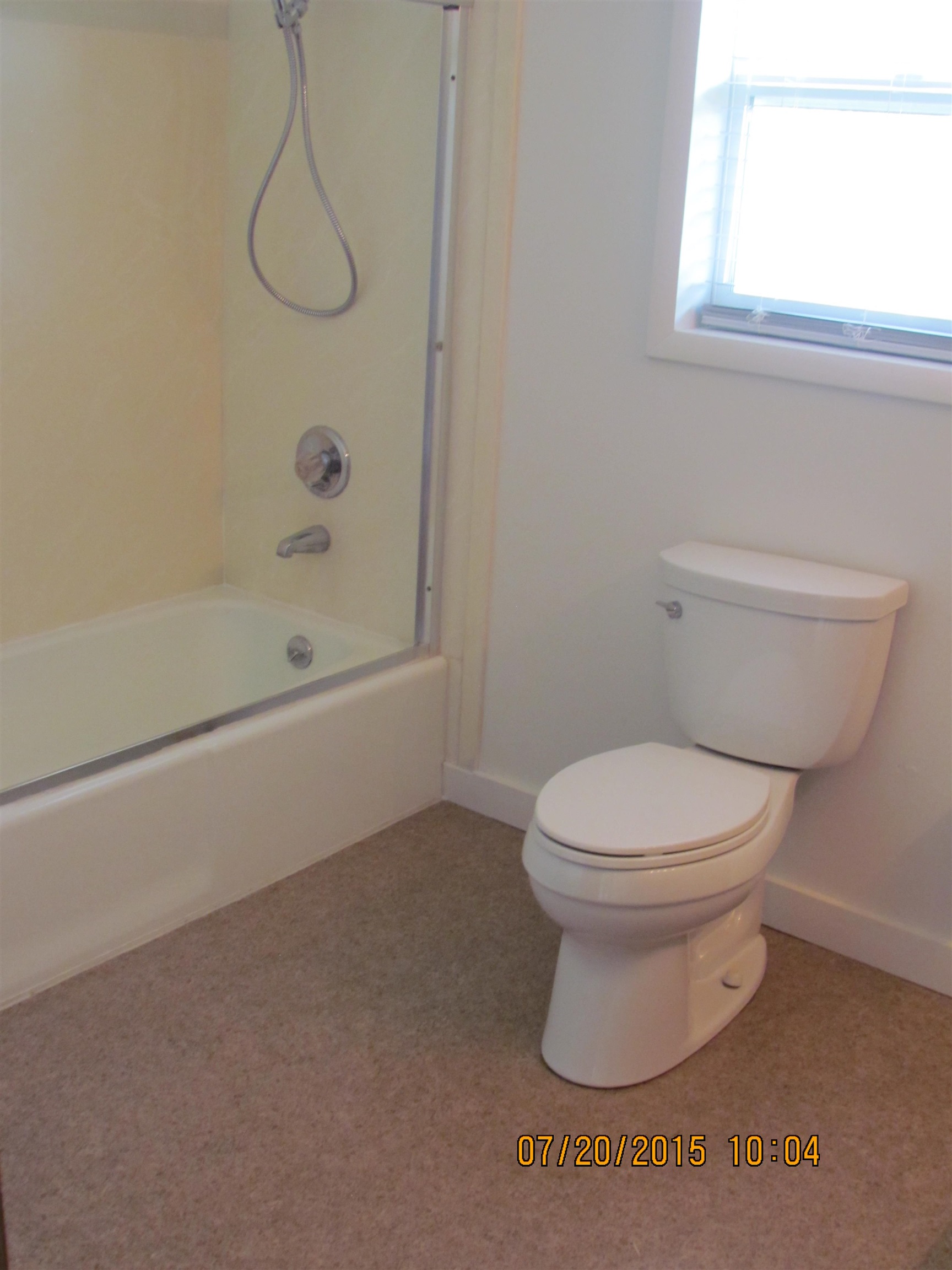 1179 17 Road Fruita, CO 81521 - Photo 16 of 41 a bathroom with a toilet and a shower