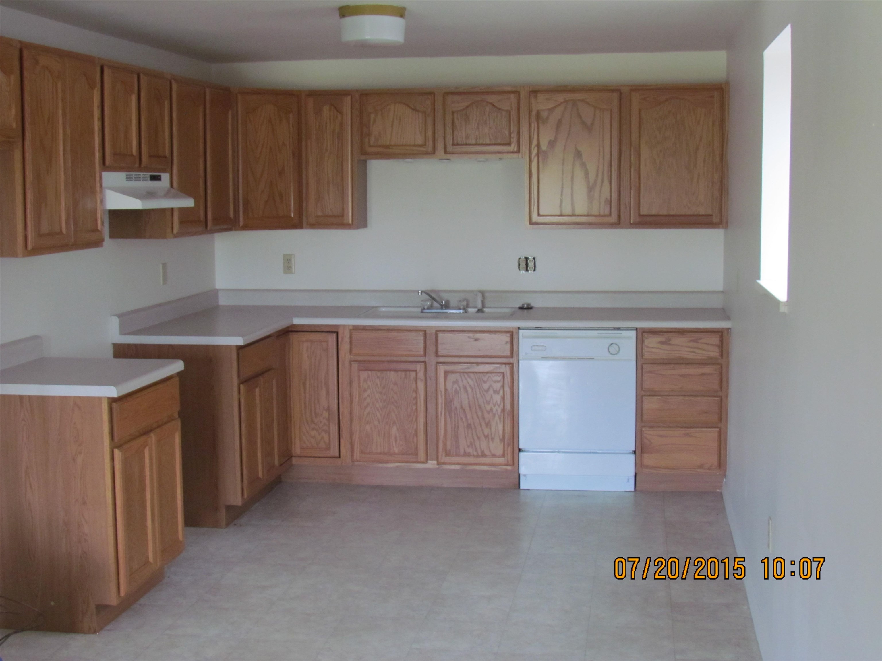 1179 17 Road Fruita, CO 81521 - Photo 22 of 41 a kitchen with a sink cabinets and appliances