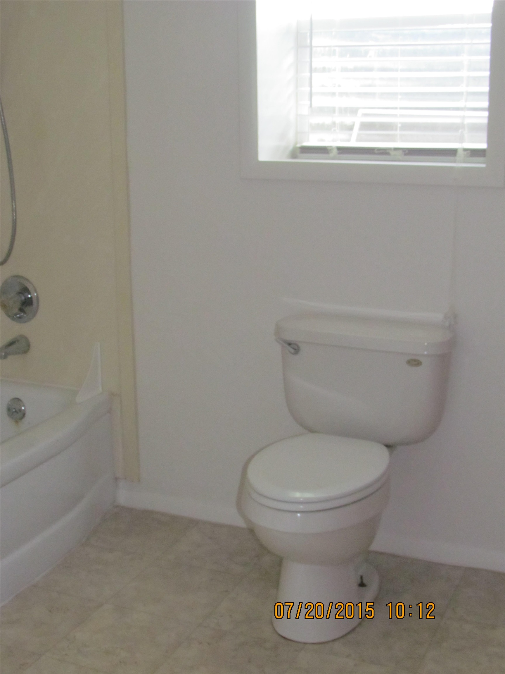 1179 17 Road Fruita, CO 81521 - Photo 26 of 41 a bathroom with a toilet and a bathtub