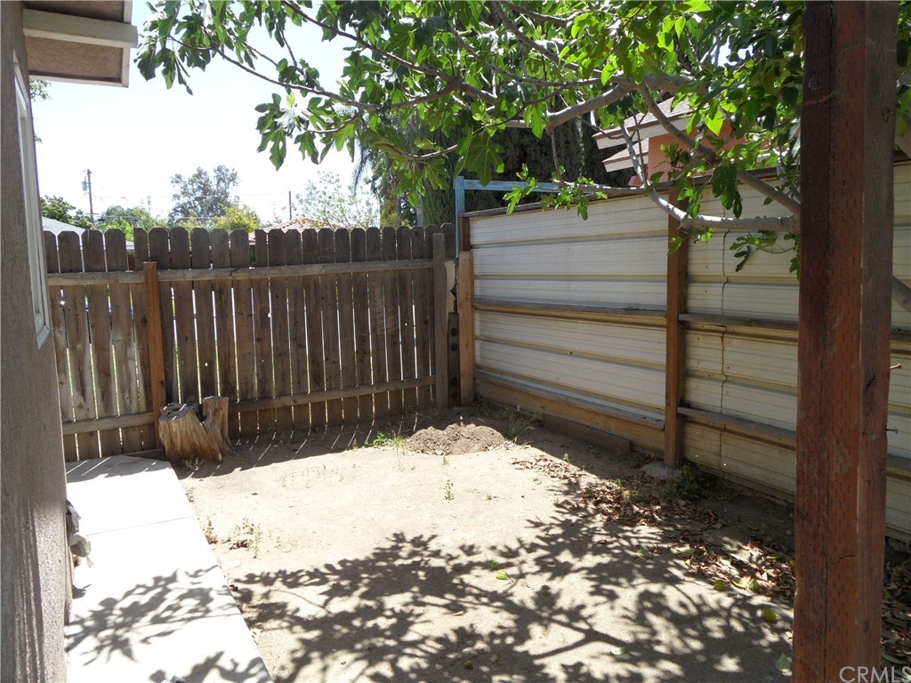 927 Daulton Avenue Madera, CA 93638 - Photo 20 of 34 a view of wooden fence and trees