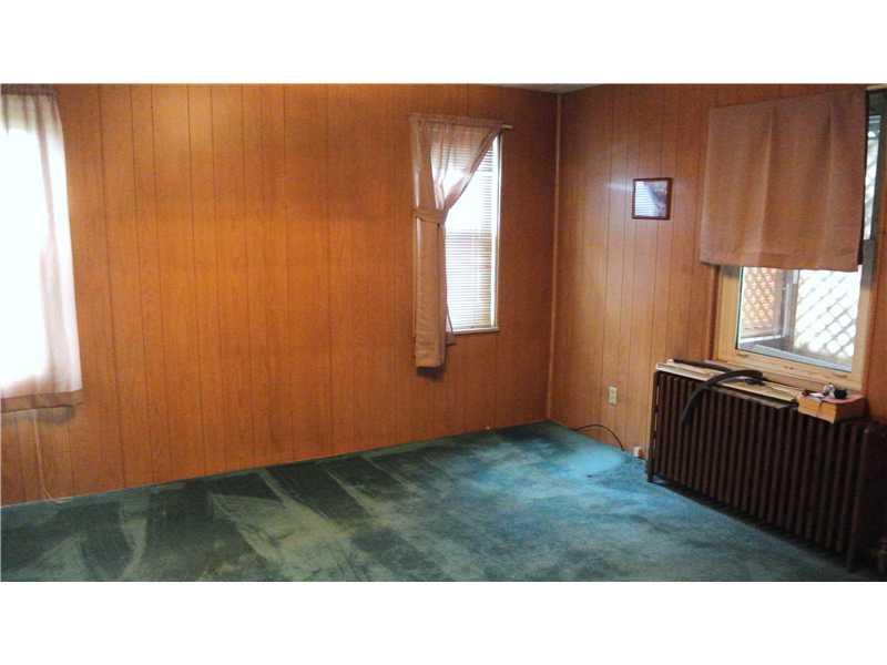 5409 Library Road Bethel Park, PA 15102 - Photo 3 of 24 Dining Room. 14x13 Panaling is covering a large stained glass window!! Hardwood under the carpet.