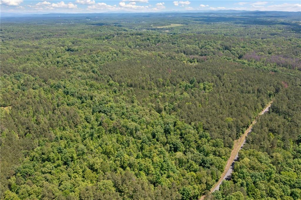 0 Timberwood Road Northwest White, GA 30184 - Photo 16 of 25 a view of a field of grass and mountain