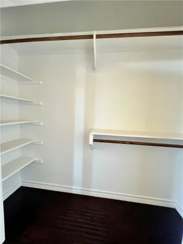 a view of small space with racks on the wall