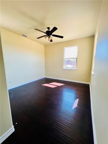 a view of room with hardwood floor