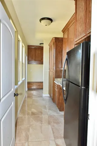 a bathroom with a shower and a tub