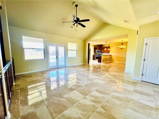 a view of a livingroom with a dinning table and chair