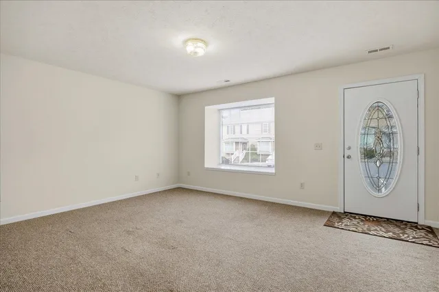 an empty room with window