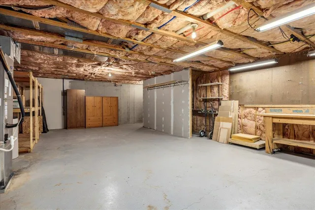 a view of a garage with an empty space