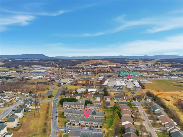 an aerial view of residential building and city view