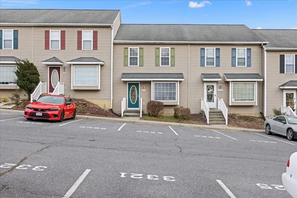a car parked in front of a house