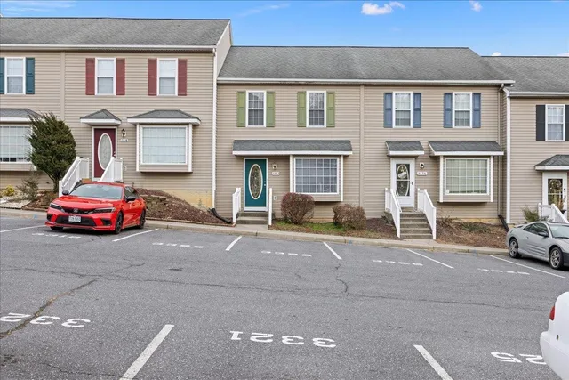 a car parked in front of a house