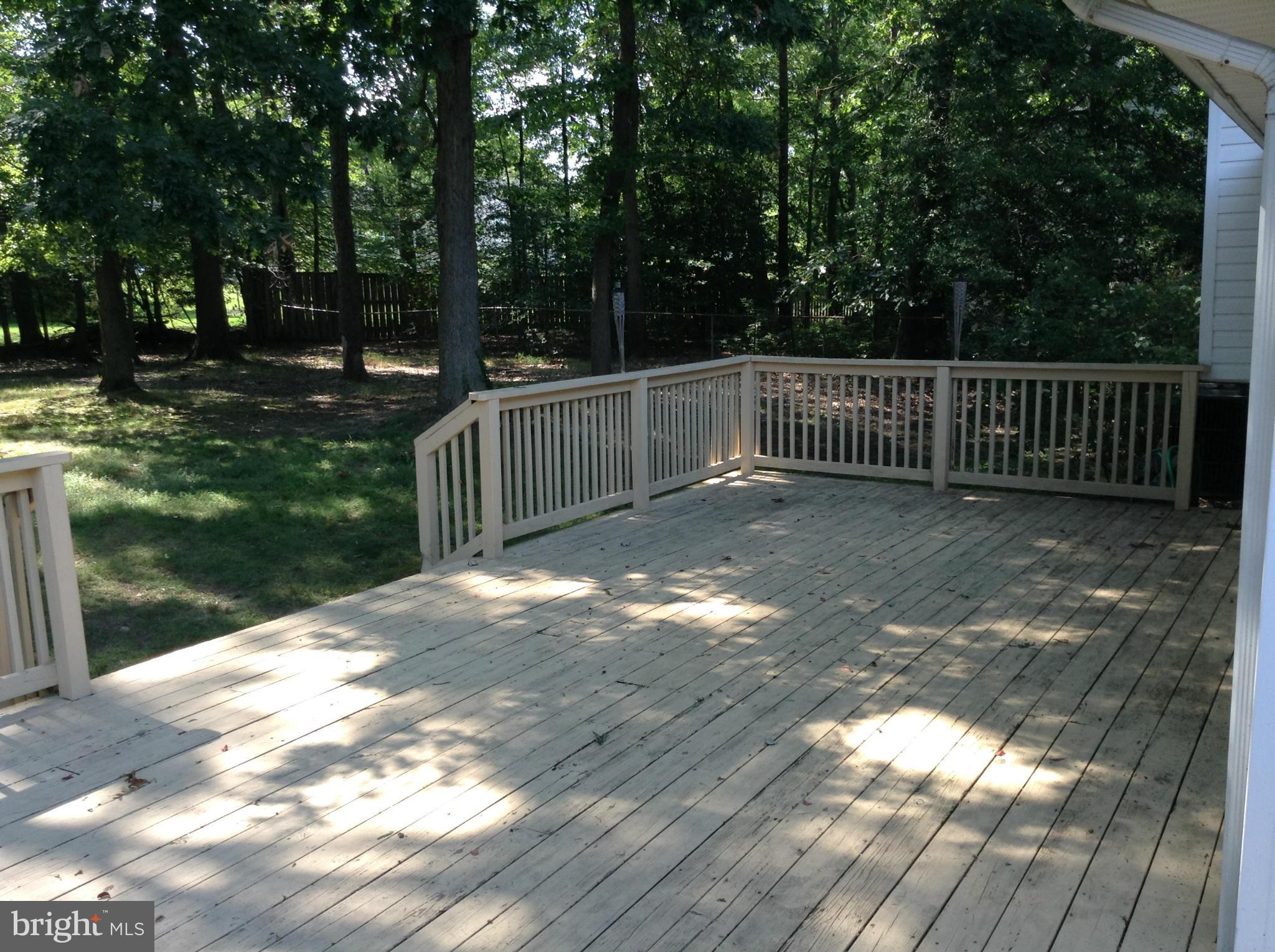 16308 Dahl Road Laurel, MD 20707 - Photo 3 of 9 a view of a yard with wooden fence