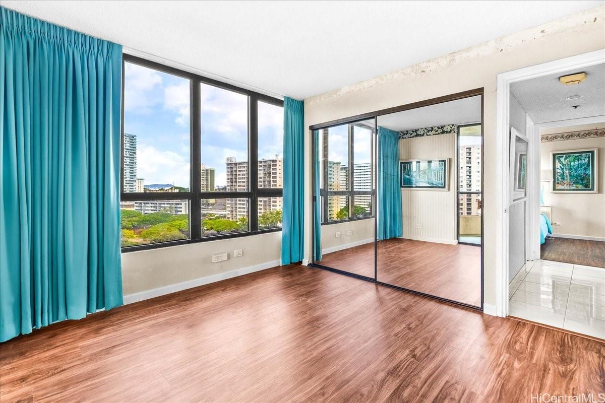 5333 Likini Street, Unit 1110 Honolulu, HI 96818 - Photo 21 of 25 a view of an entryway with wooden floor