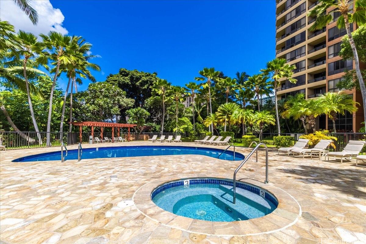 5333 Likini Street, Unit 1110 Honolulu, HI 96818 - Photo 22 of 25 a view of swimming pool with outdoor seating