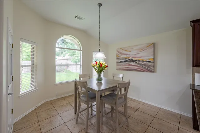a view of living room and dining room