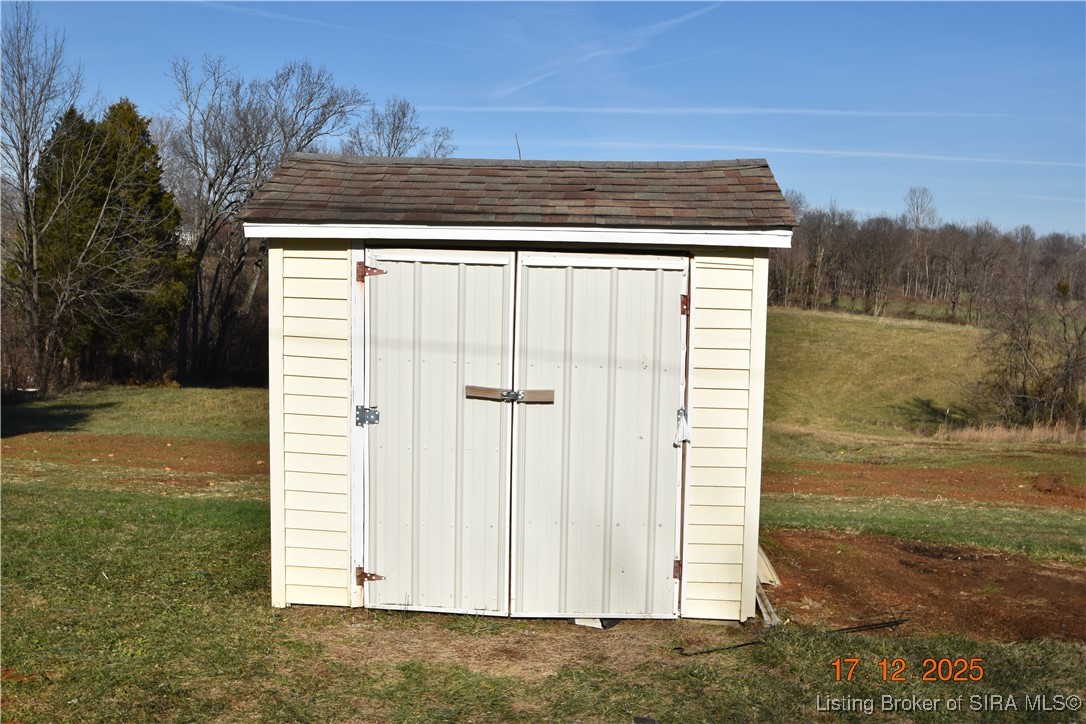 10204 Dalby Road Georgetown, IN 47122 - Photo 18 of 27 Storage Shed stays.