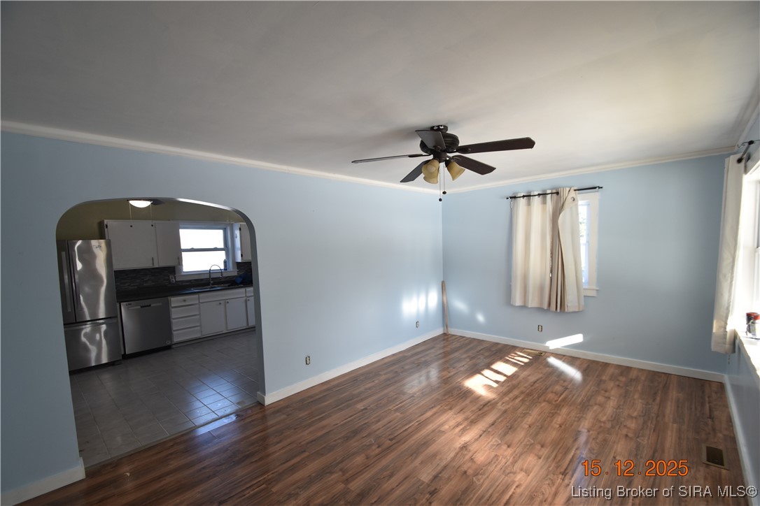 10204 Dalby Road Georgetown, IN 47122 - Photo 3 of 27 Living Room with view of the kitchen. Arched doorway into the kitchen.