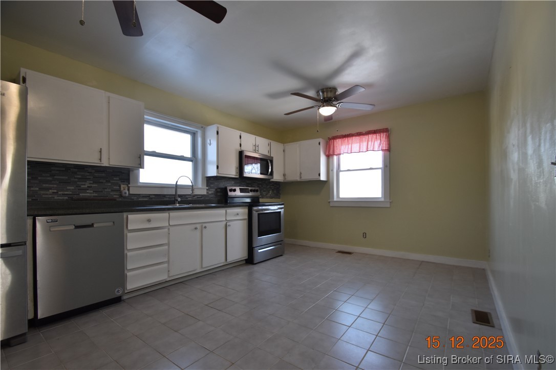 10204 Dalby Road Georgetown, IN 47122 - Photo 4 of 27 Spacious eat-in kitchen. Two ceiling fans.