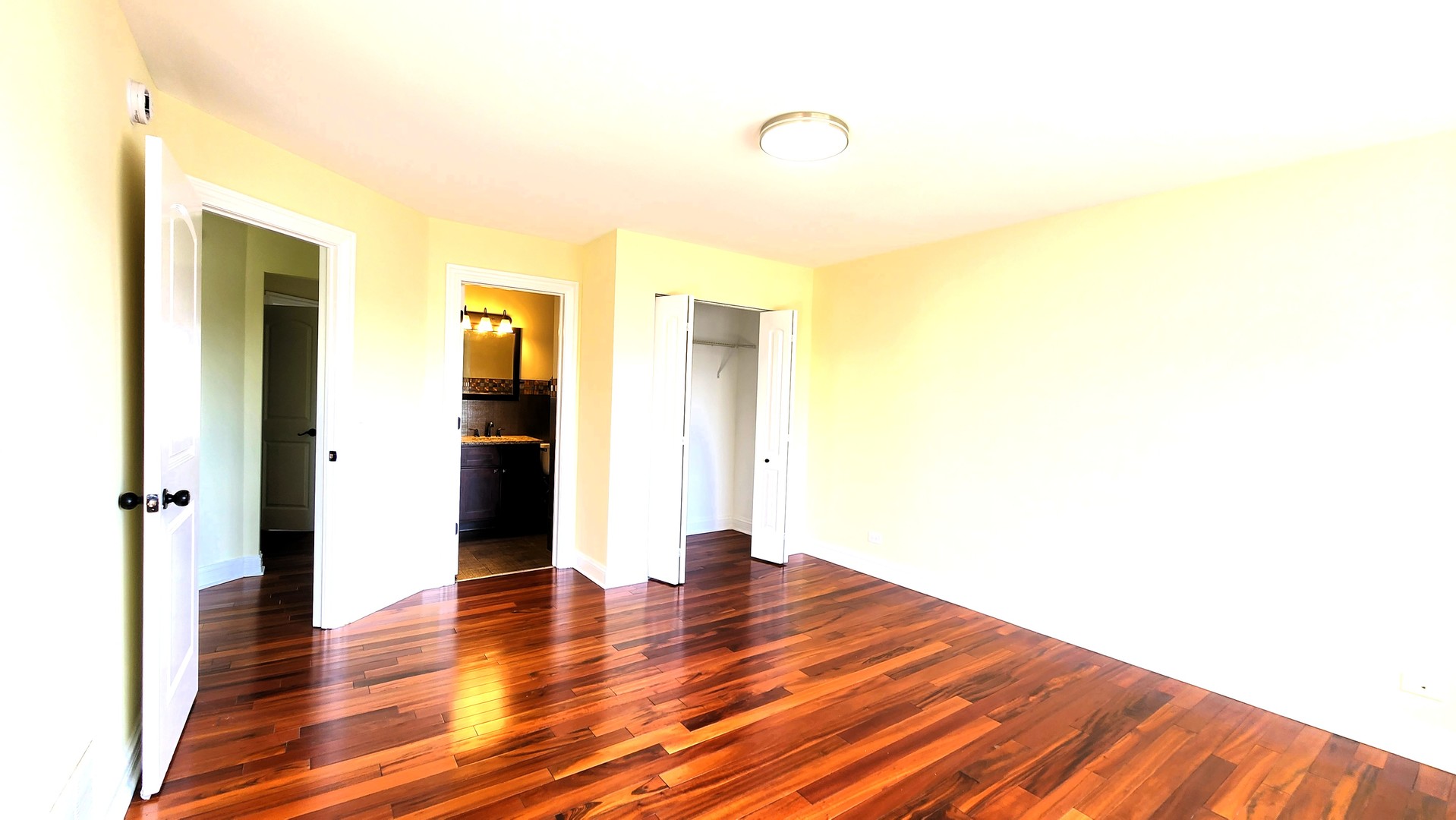 2164 West Concord Lane Addison, IL 60101 - Photo 12 of 21 a view of a room with wooden floor