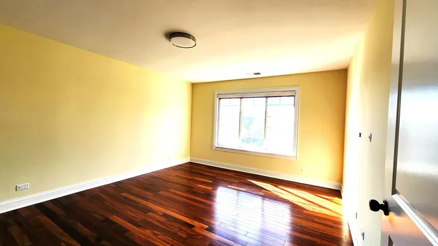 a view of an empty room and window