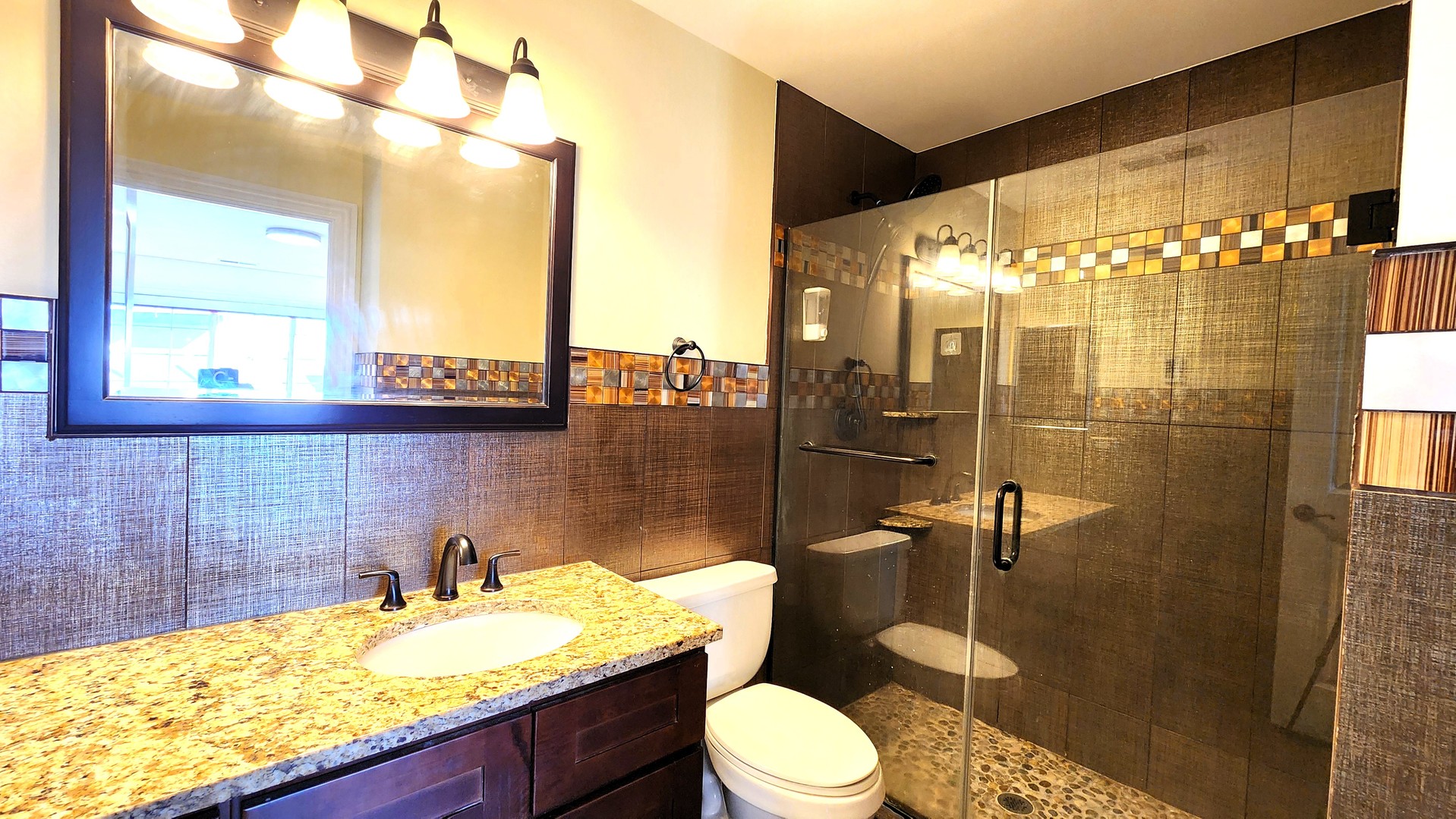 2164 West Concord Lane Addison, IL 60101 - Photo 13 of 21 a bathroom with a granite countertop sink toilet and shower