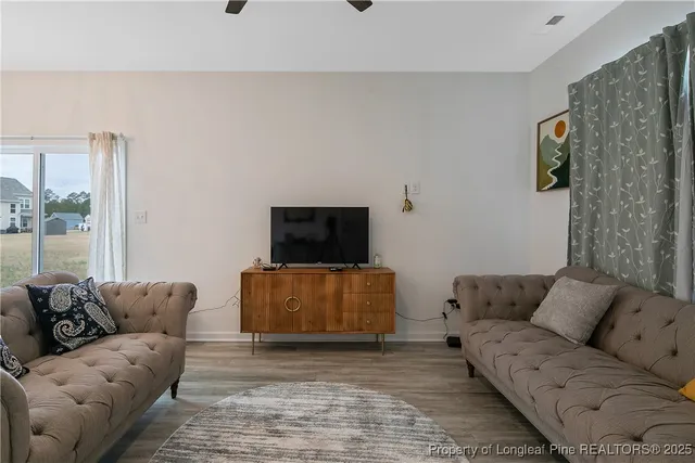a living room with furniture and a couch