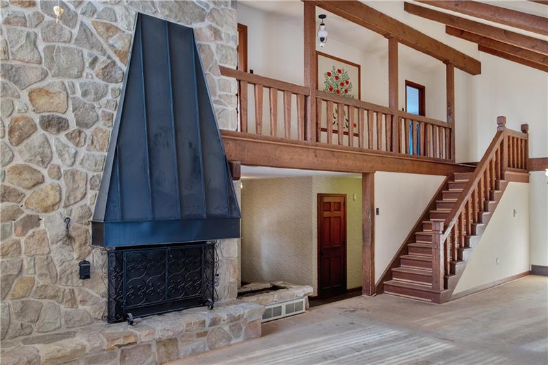 624 Whistler Drive Rochester, PA 15074 - Photo 14 of 23 Two story stone fireplace