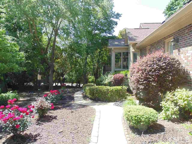 a view of a house with a garden