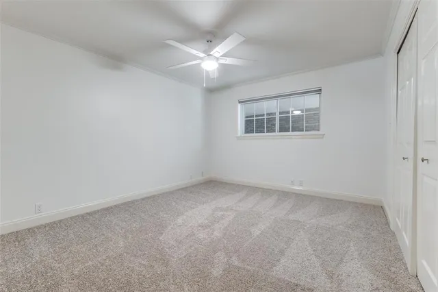 a bathroom with a granite countertop sink a toilet and a bathtub