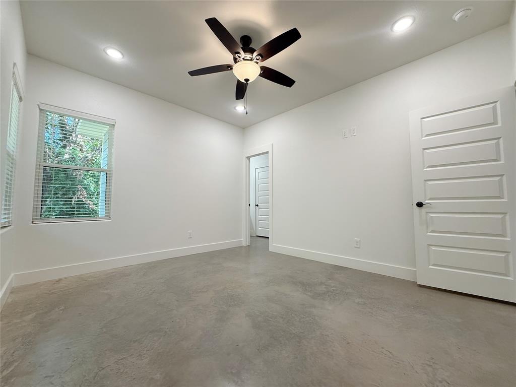 1905 South Lamar Denison, TX 75021 - Photo 14 of 27 Unfurnished room featuring finished concrete flooring, ceiling fan, and recessed lighting