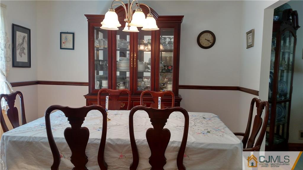 32 Harding Avenue Edison, NJ 08820 - Photo 3 of 25 a view of a livingroom with furniture and entryway