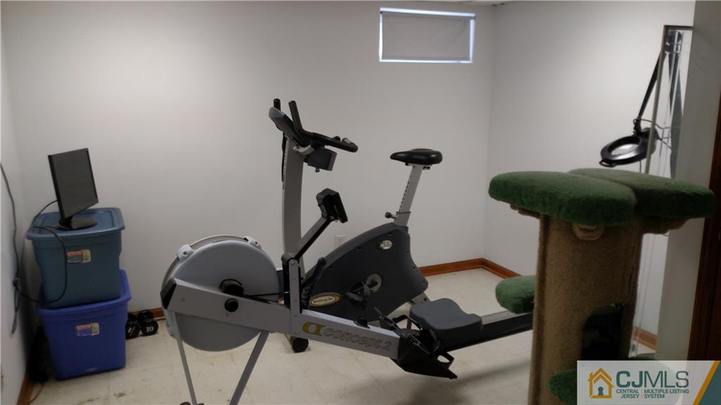 32 Harding Avenue Edison, NJ 08820 - Photo 22 of 25 a view of a room with gym equipment