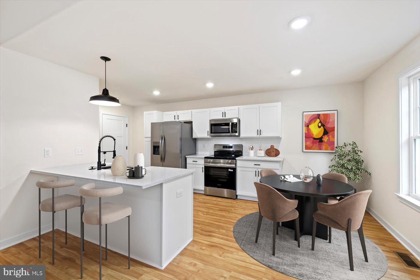 62 Rose Way Colonial Beach, VA 22443 - Photo 5 of 43 a view of a dining room with furniture