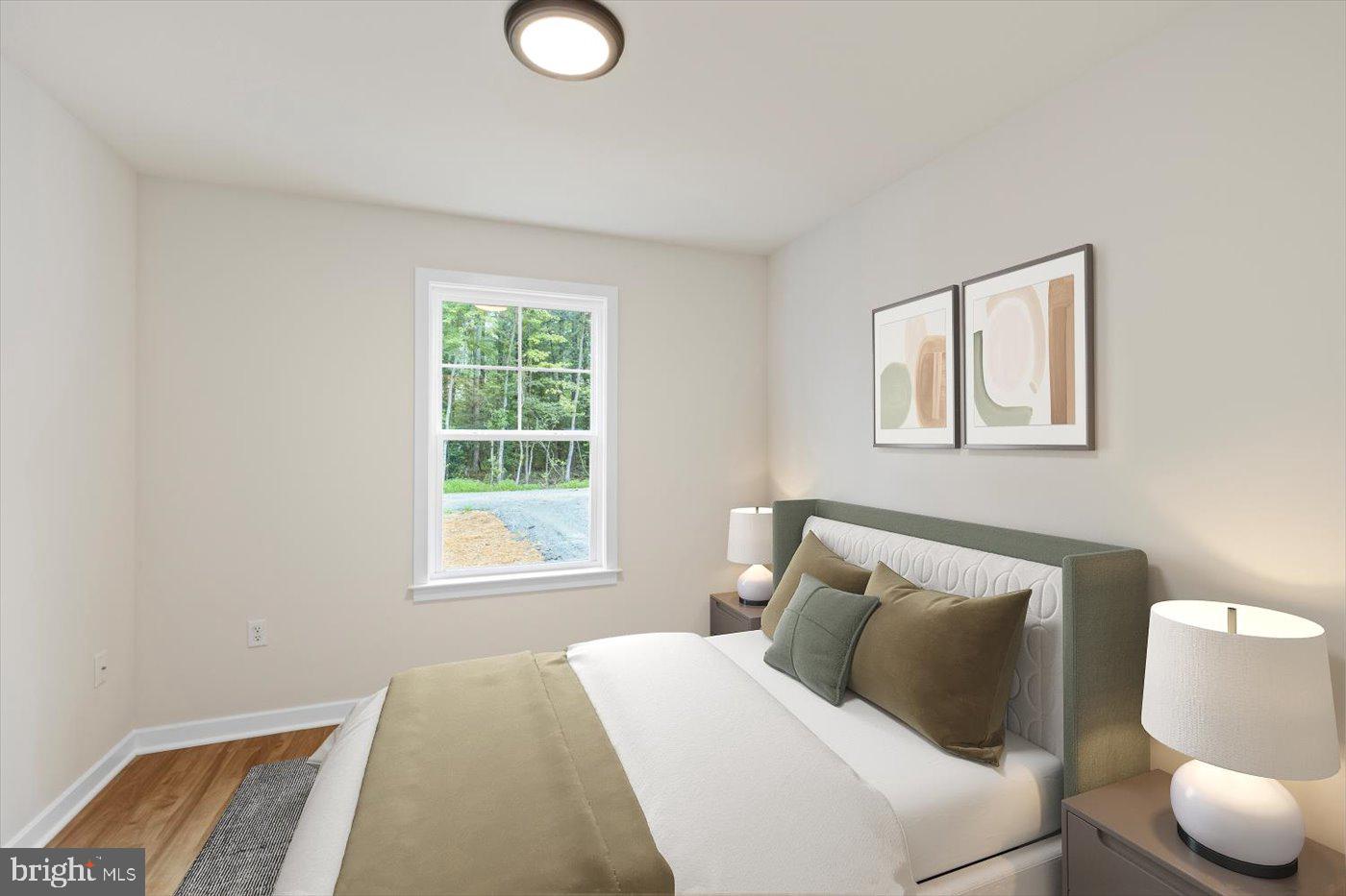 62 Rose Way Colonial Beach, VA 22443 - Photo 7 of 43 a bedroom with a bed and window