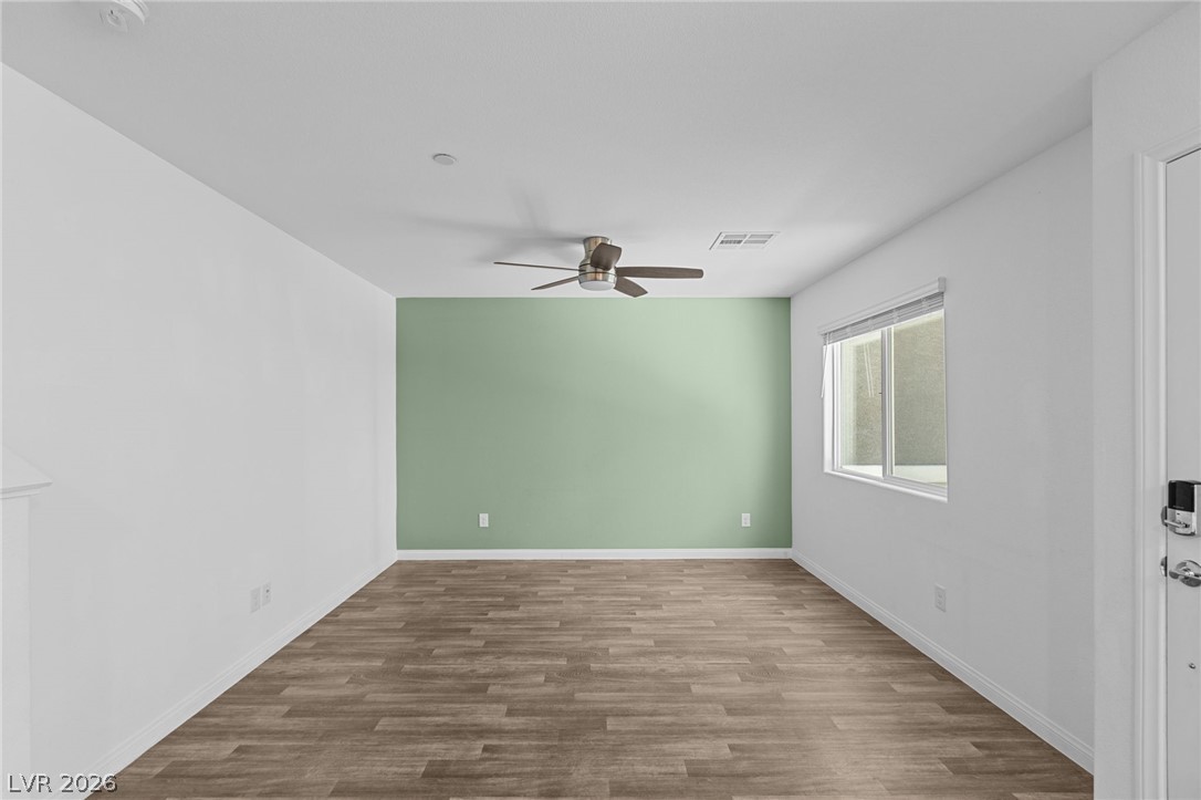 12367 Indigo Montage Road, Unit 3 Las Vegas, NV 89183 - Photo 6 of 33 This versatile room offers an ideal canvas for personalization, featuring durable flooring and ample natural light.