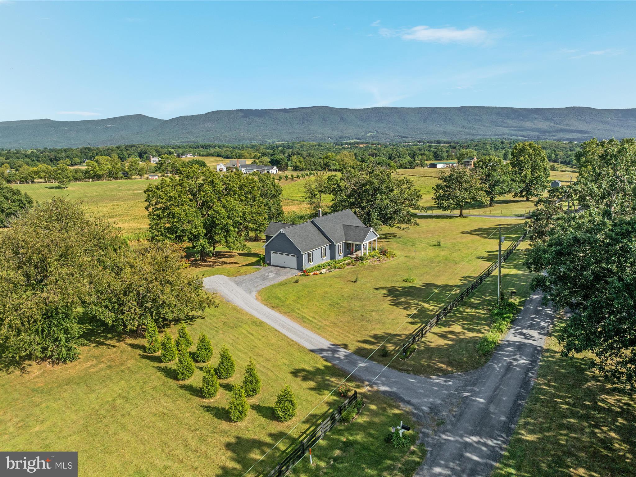 1857 Polk Road Edinburg, VA 22824 - Photo 1 of 55 a view of a lake with a mountain