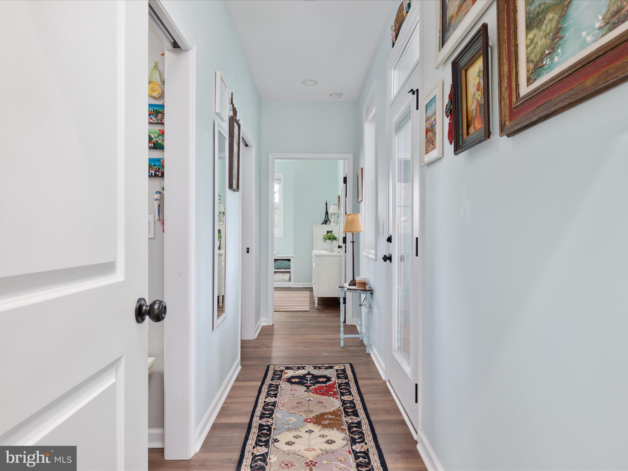1857 Polk Road Edinburg, VA 22824 - Photo 18 of 55 a view of a hallway with wooden floor and staircase