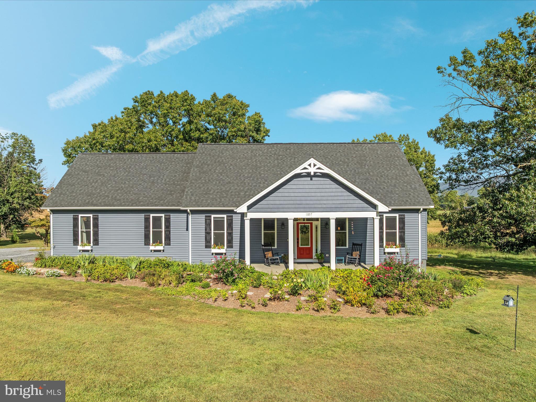 1857 Polk Road Edinburg, VA 22824 - Photo 2 of 55 front view of a house with a yard