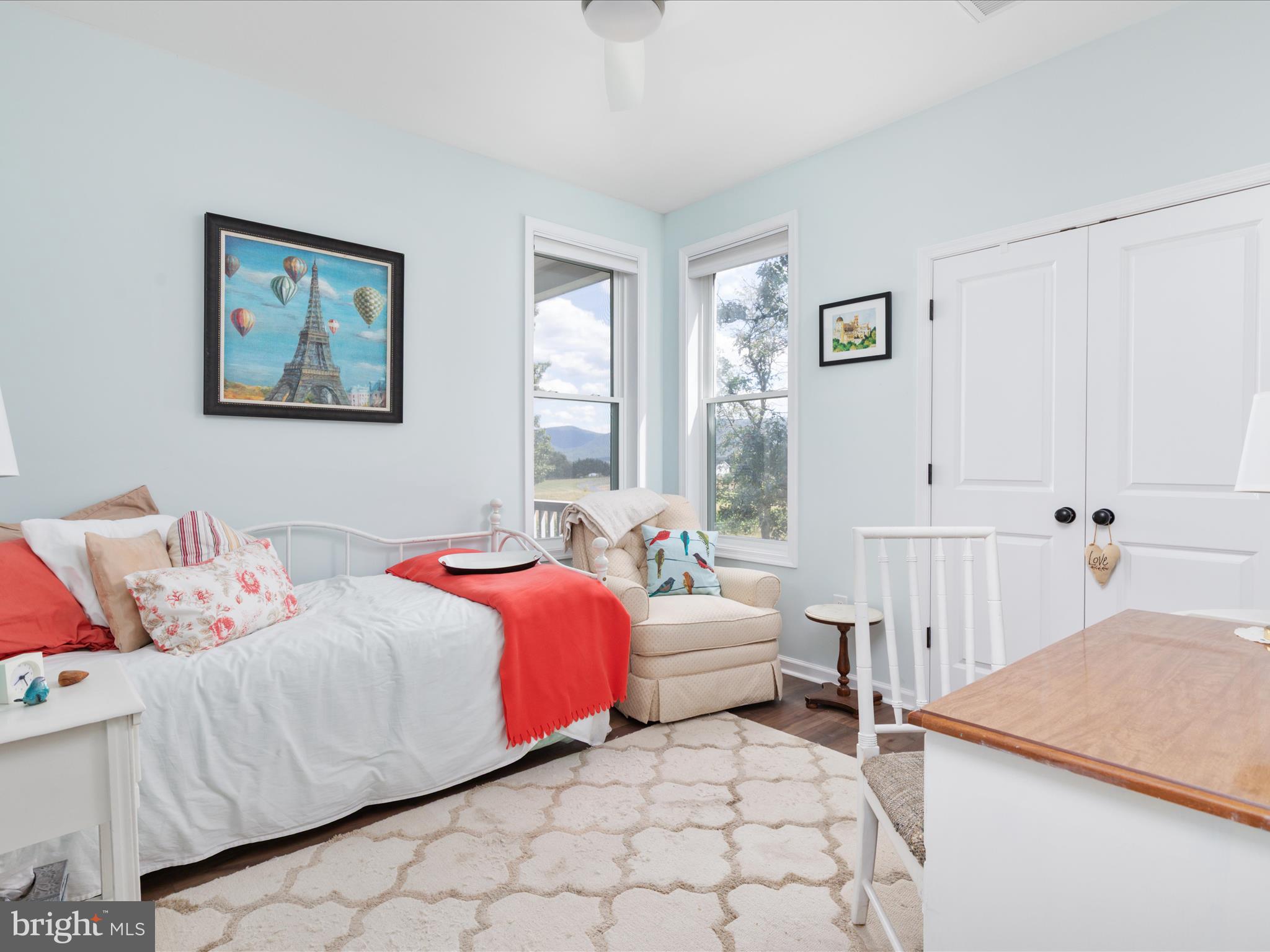 1857 Polk Road Edinburg, VA 22824 - Photo 23 of 55 a bedroom with a bed and a window