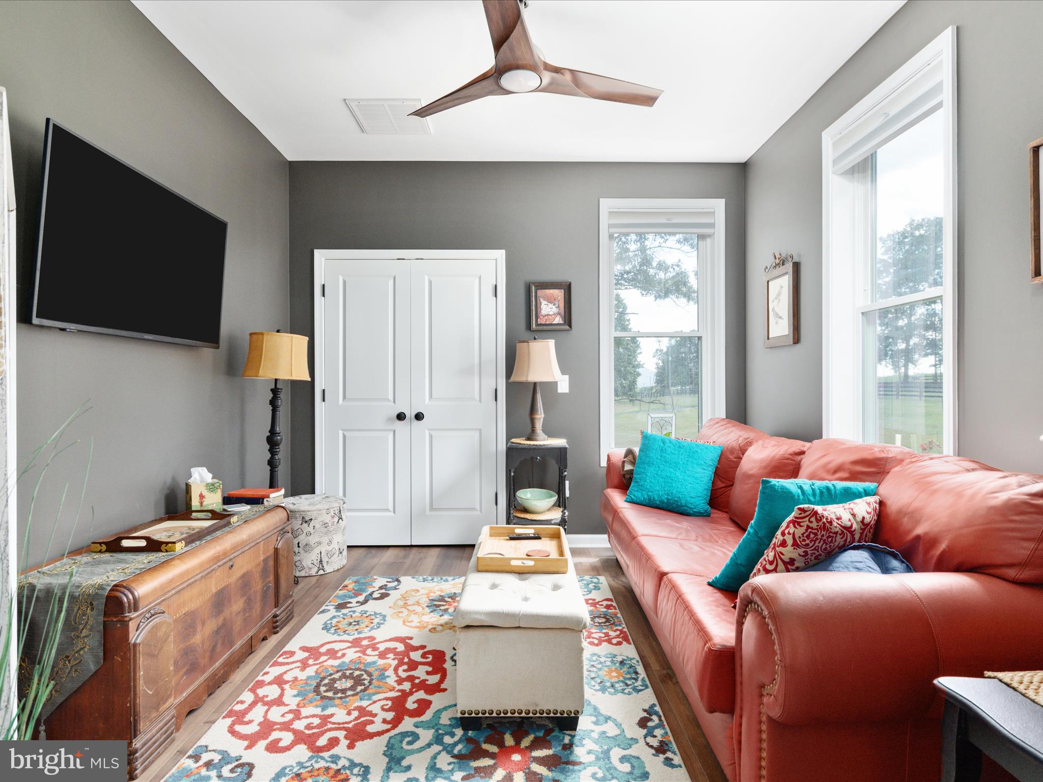 1857 Polk Road Edinburg, VA 22824 - Photo 25 of 55 a living room with furniture and a flat screen tv