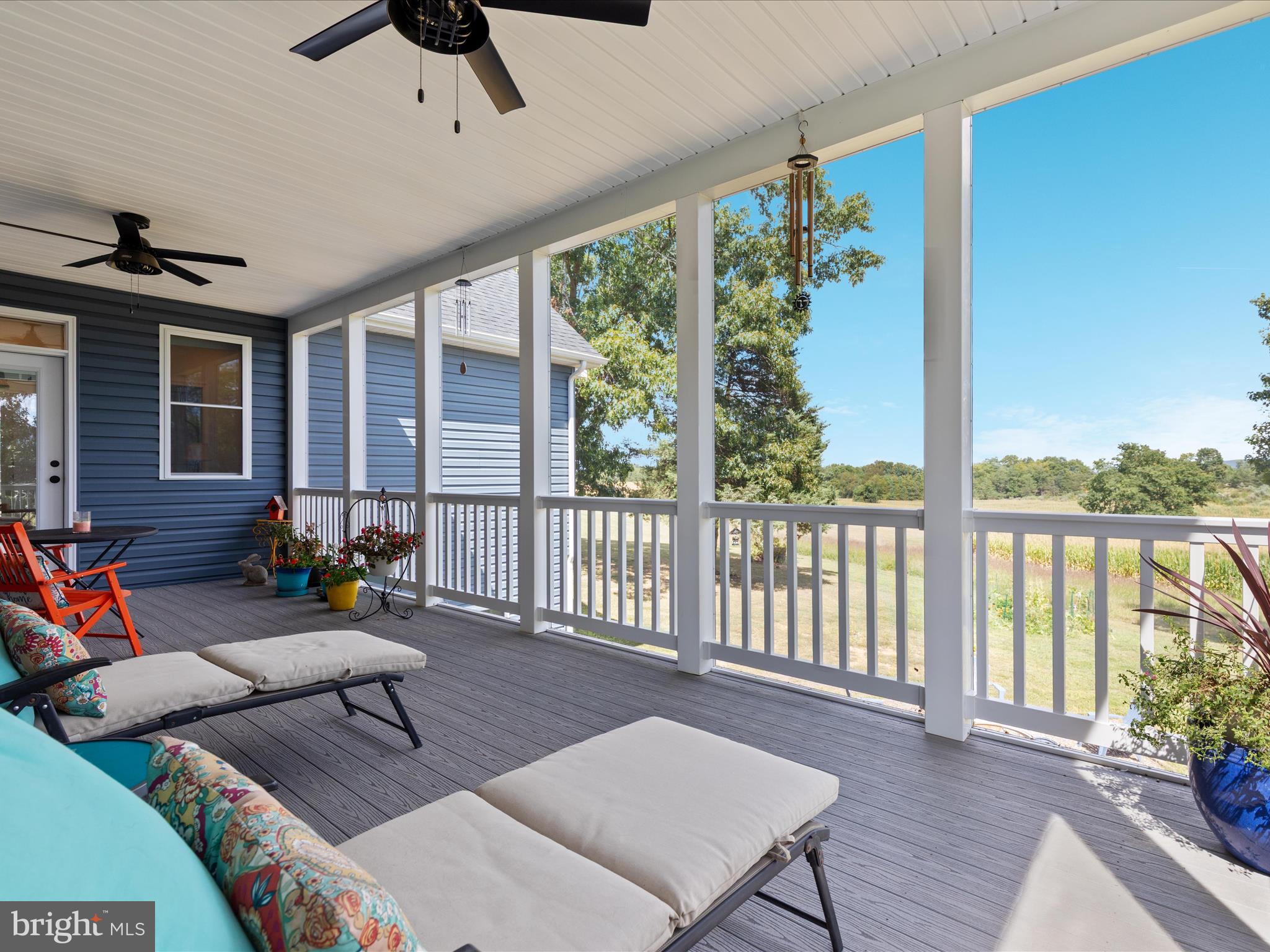 1857 Polk Road Edinburg, VA 22824 - Photo 29 of 55 a living room with furniture and a large window