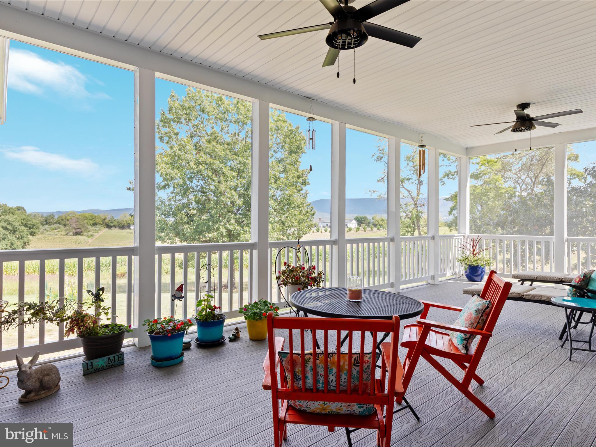 1857 Polk Road Edinburg, VA 22824 - Photo 30 of 55 a dining room with furniture window and wooden floor