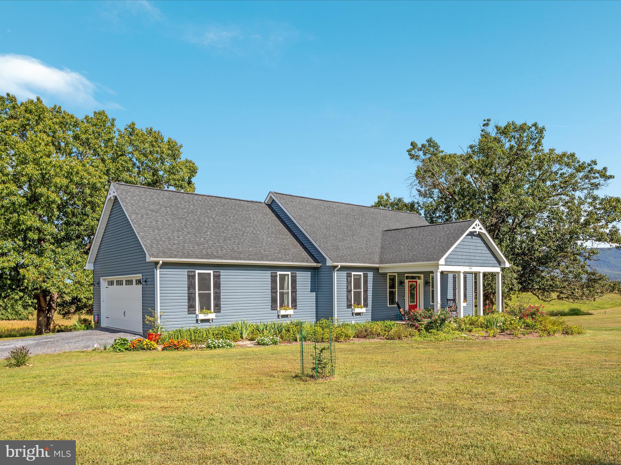 1857 Polk Road Edinburg, VA 22824 - Photo 3 of 55 a front view of a house with swimming pool