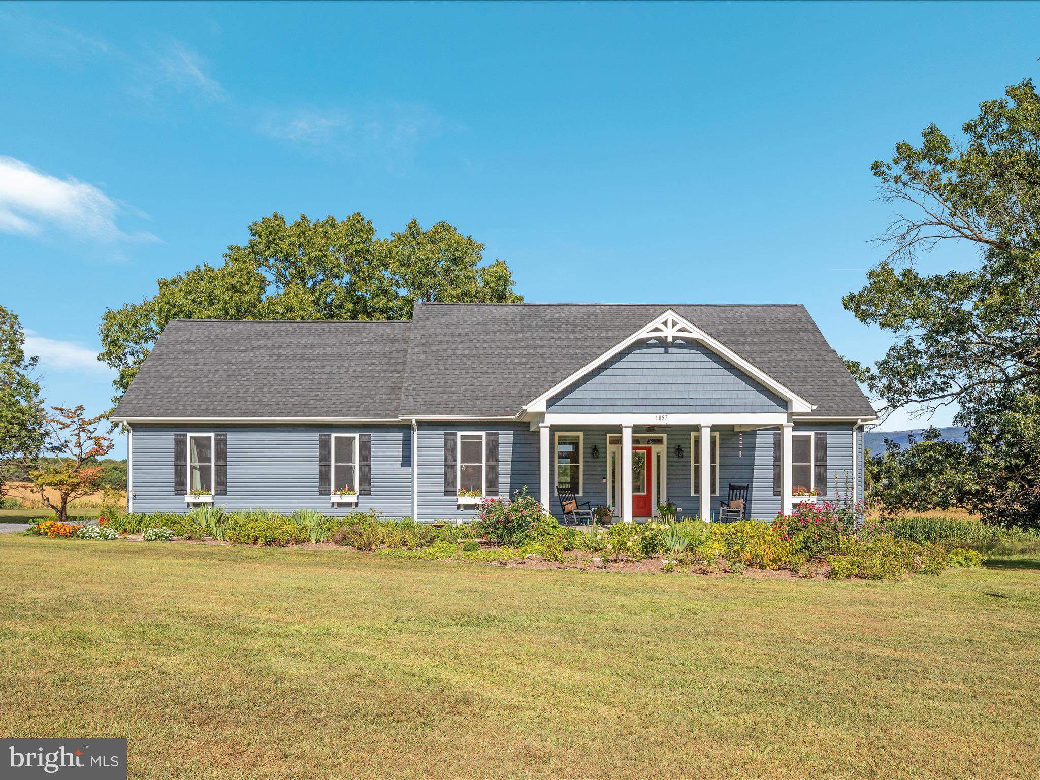 1857 Polk Road Edinburg, VA 22824 - Photo 34 of 55 a front view of a house with a garden