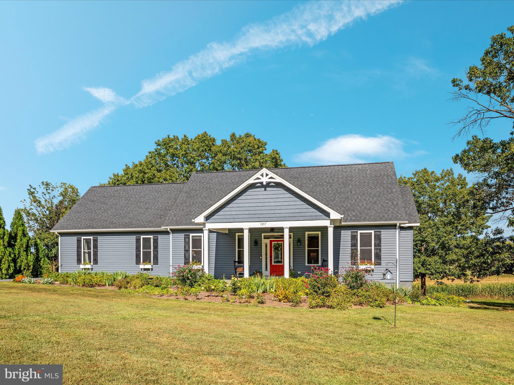 1857 Polk Road Edinburg, VA 22824 - Photo 35 of 55 a front view of a house with a garden