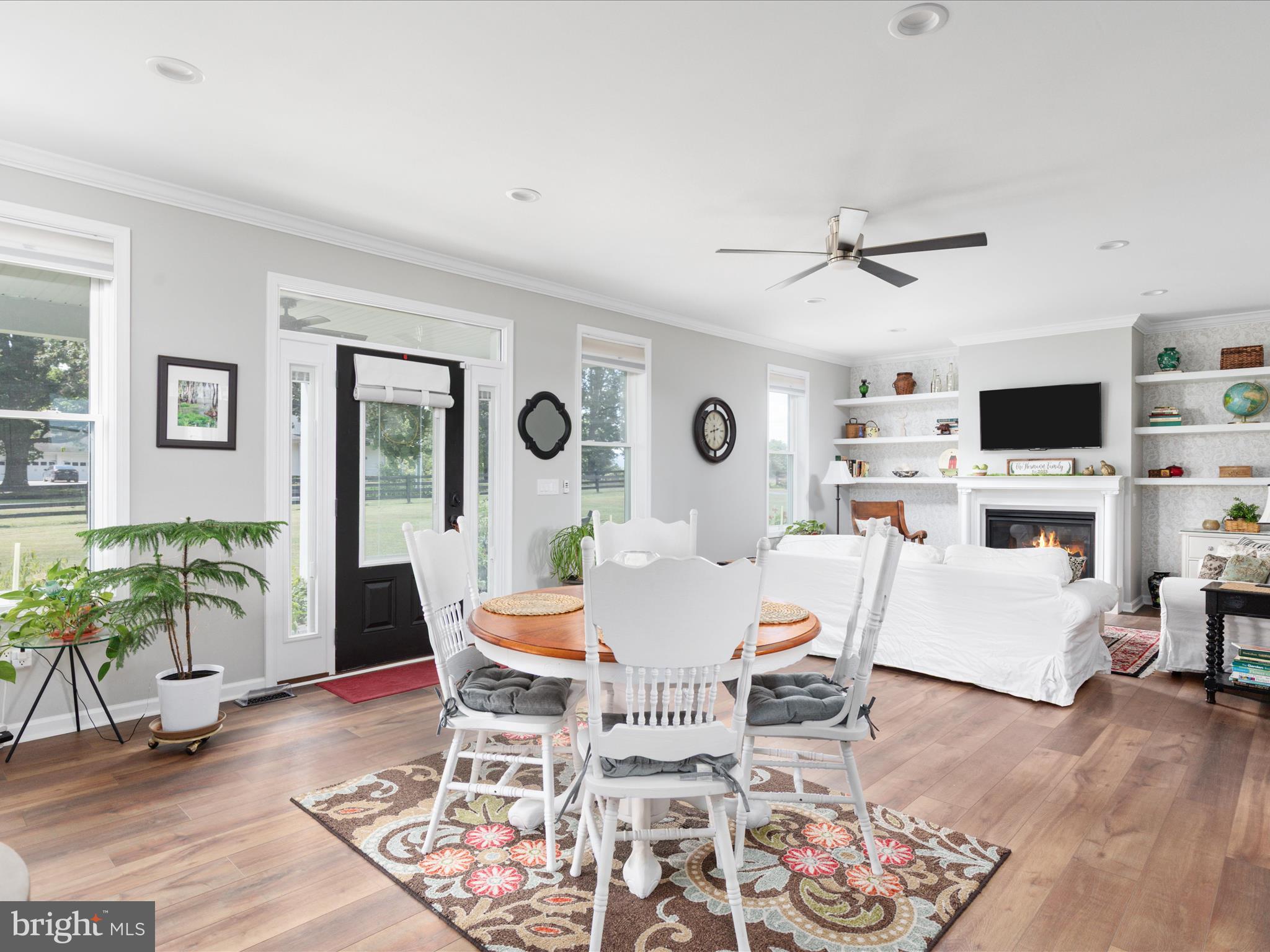 1857 Polk Road Edinburg, VA 22824 - Photo 6 of 55 a living room with furniture a fireplace and a flat screen tv