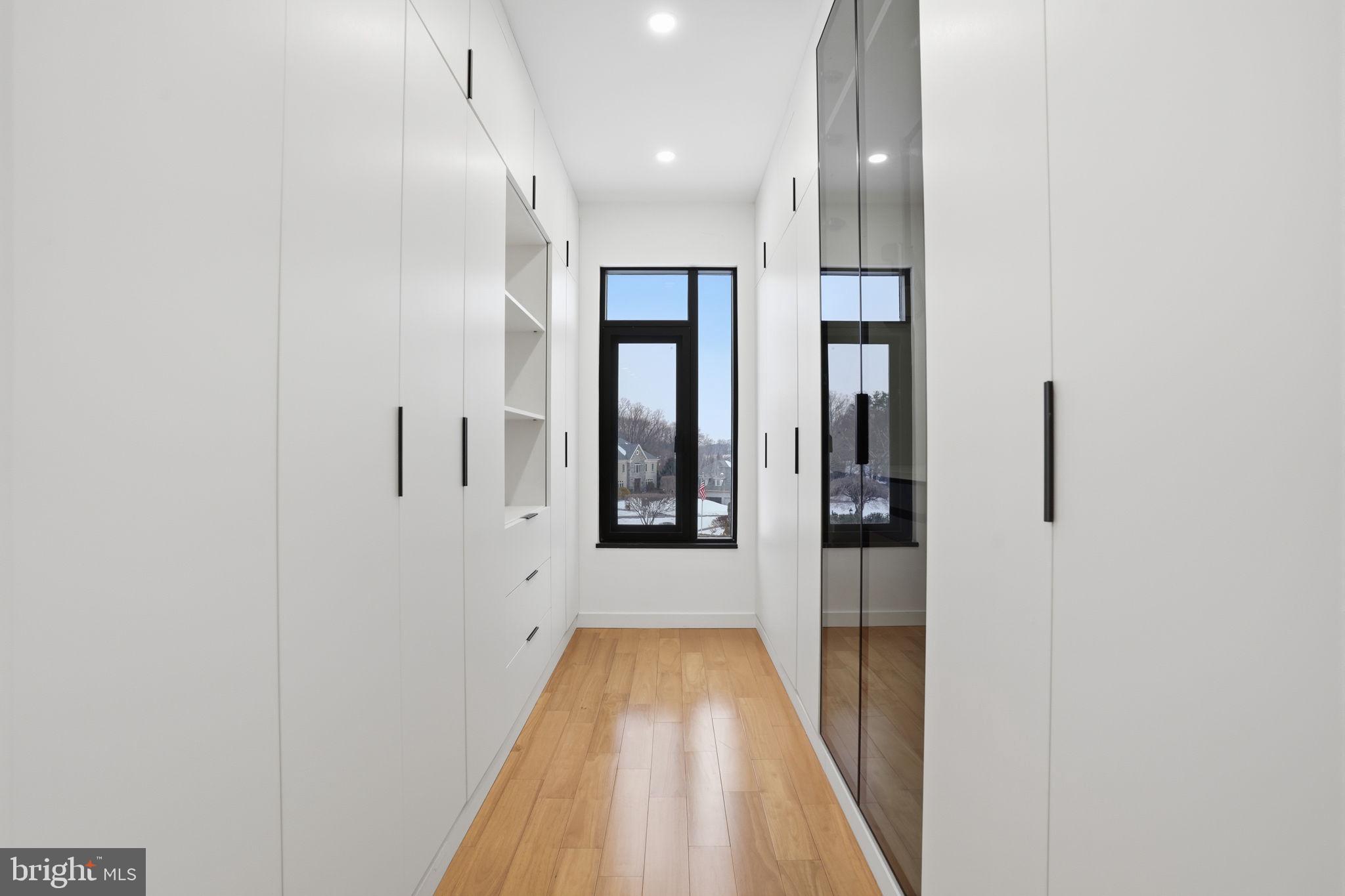 1047 Welsh Road Huntingdon Valley, PA 19006 - Photo 54 of 75 a view of a hallway with wooden floor and staircase