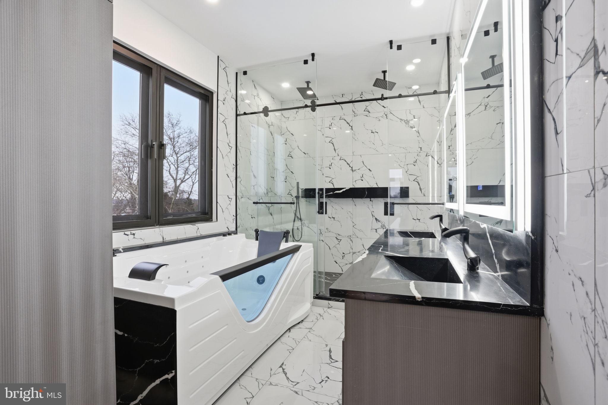 1047 Welsh Road Huntingdon Valley, PA 19006 - Photo 58 of 75 a kitchen with a sink and a large window