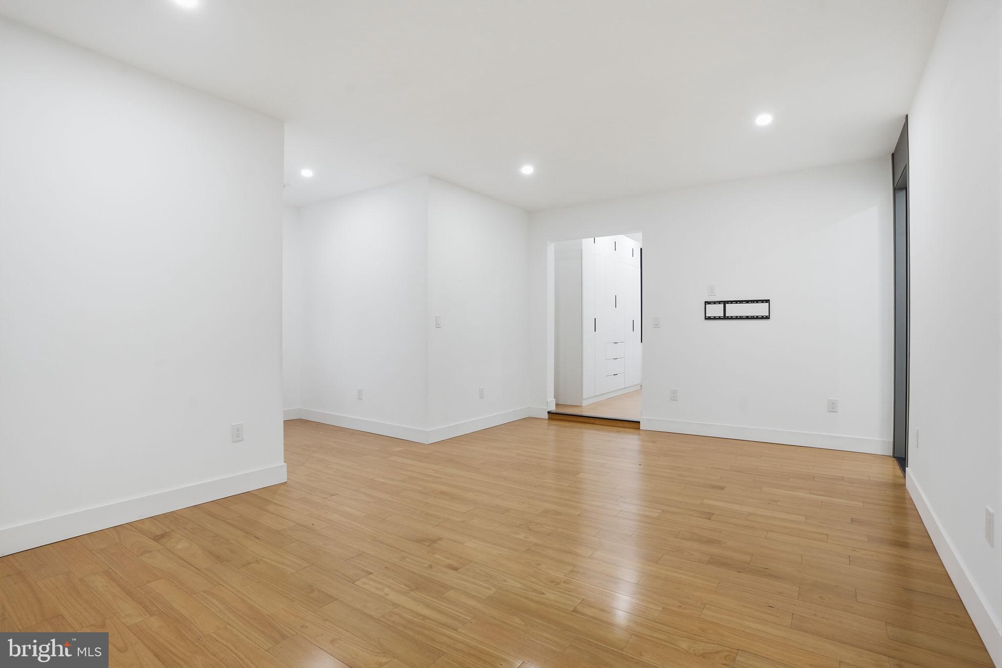 1047 Welsh Road Huntingdon Valley, PA 19006 - Photo 64 of 75 a view of an empty room with wooden floor