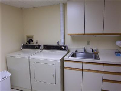 Undisclosed Address Centerville, MA 02632 - Photo 18 of 21 a utility room with dryer and washer